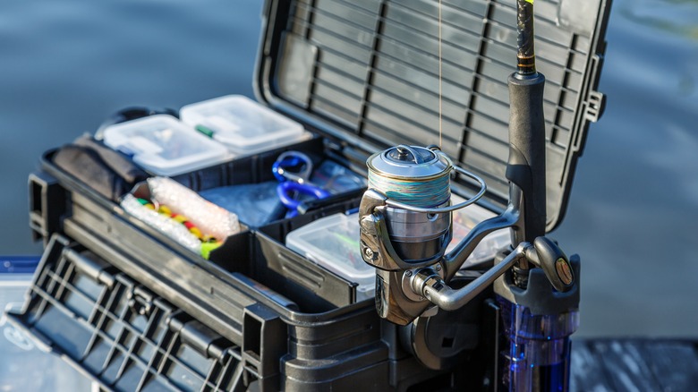Tackle box and loaded fishing reel 