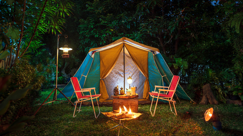 Campsite with lanterns and fire