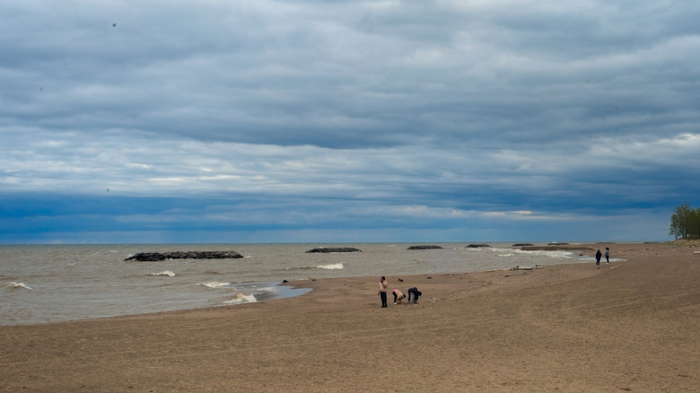 A few people on the beach at Presque Isle State Park