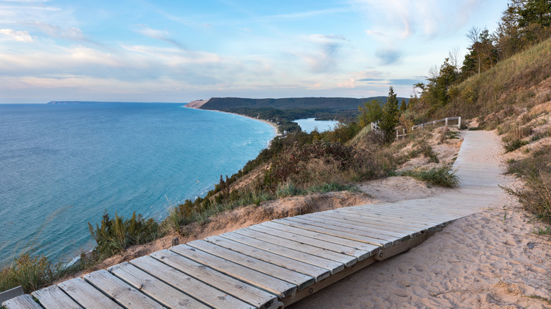 A wooden boardwalk wandering through Sleeping Bear Dunes