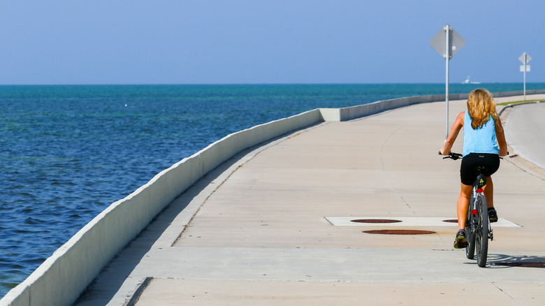 Woman cycling in the sun on Key West, Florida