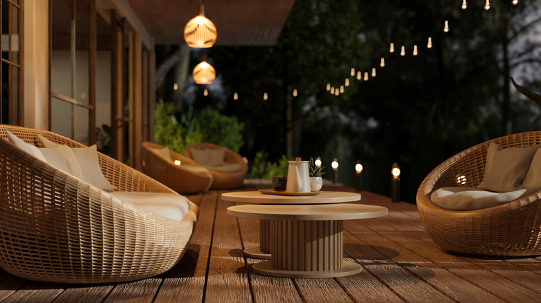 Cozy porch at night in radiant, warm lighting