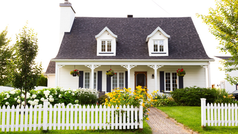 house with white picket fence