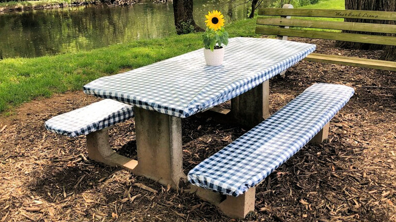 Photo of vinyl fitted picnic table cover and benches