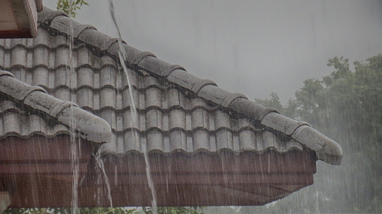 Heavy rain running off rooftop