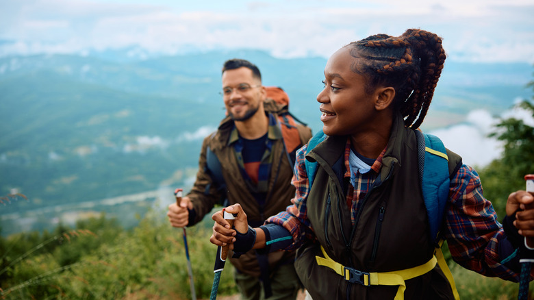 Two people backpacking and hiking