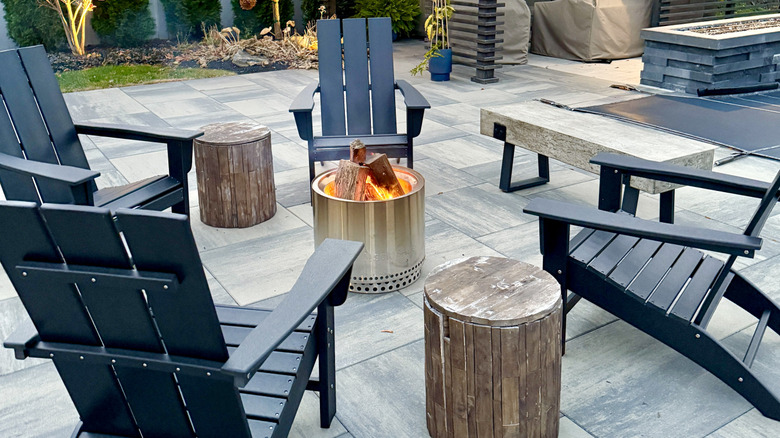 Fire pit surrounded by chairs