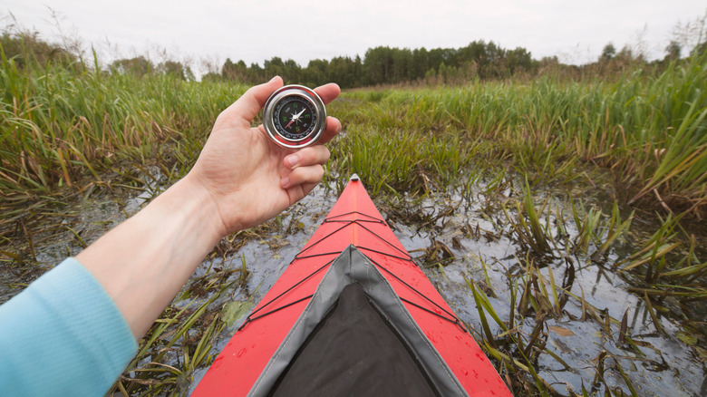 Kayaker with compass