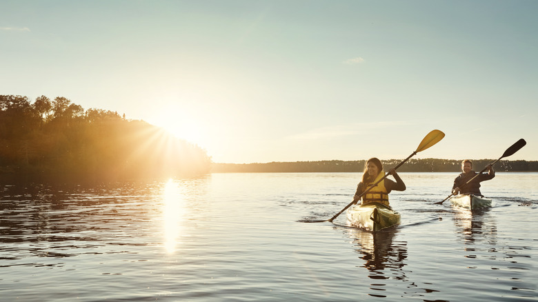 Woman and man kayaking