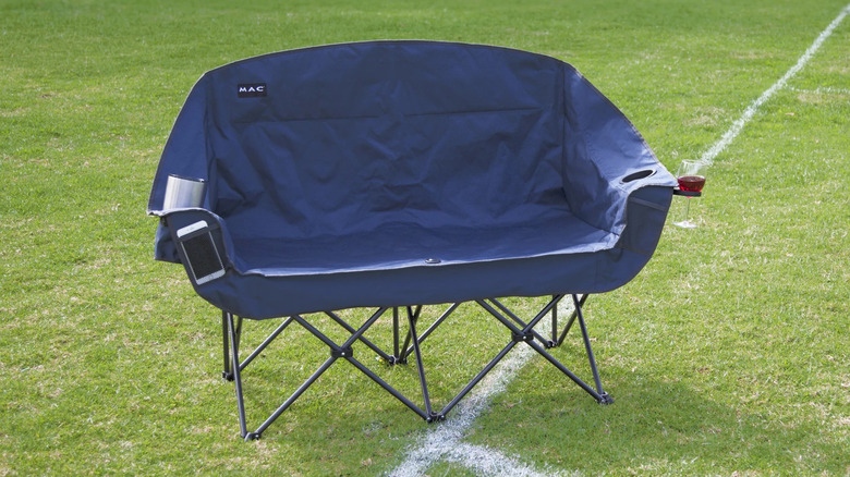 Mac Sports double camp chair on a sports field