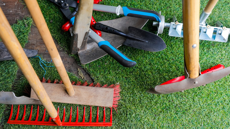 Variety of tools on artificial grass