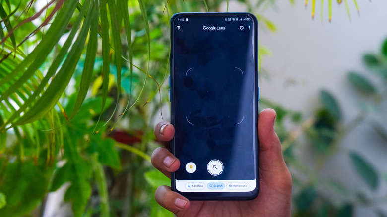 A smartphone with Google Lens on the screen