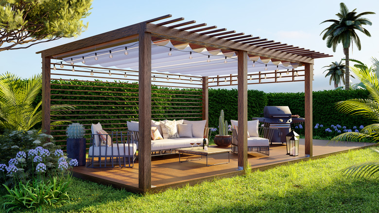 A pergola sheltering a teak deck