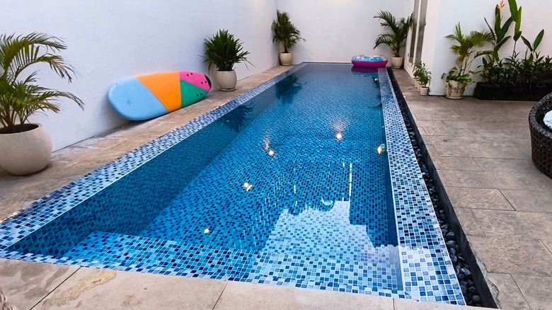 Small tiled backyard pool