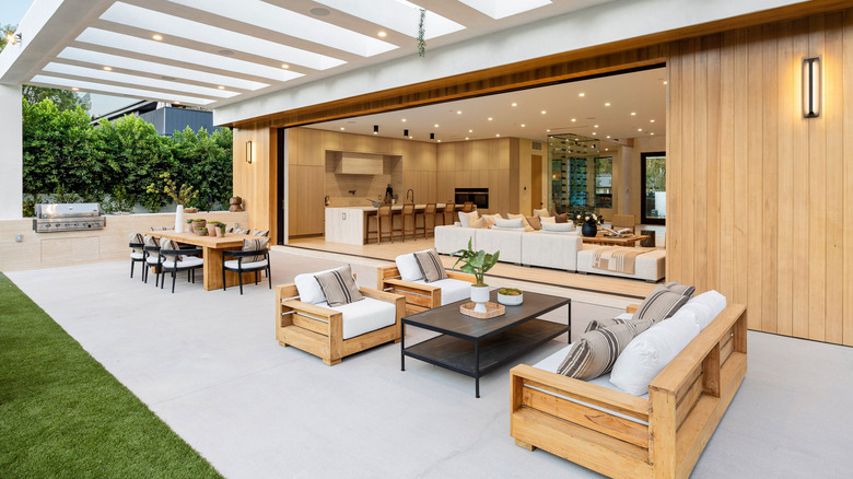 A patio with luxurious and modern outdoor furniture