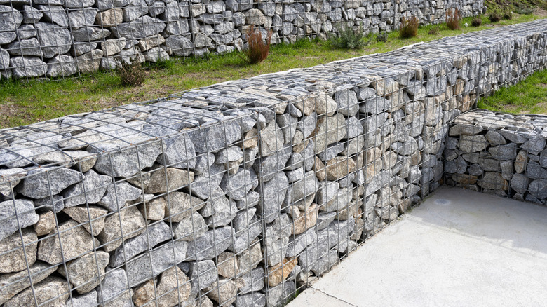 Gabion walls in sloped yard