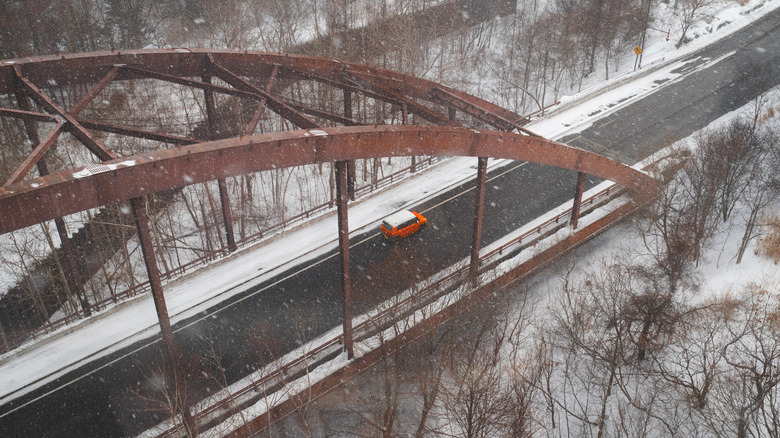 driving on bridge in winter