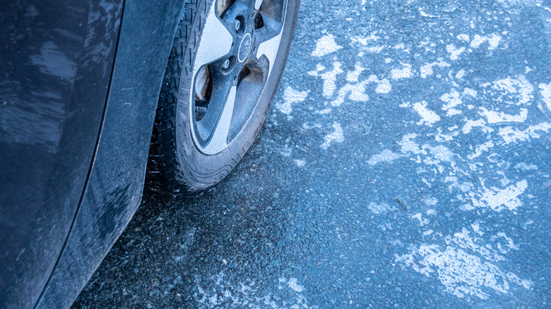 car tire on icy road
