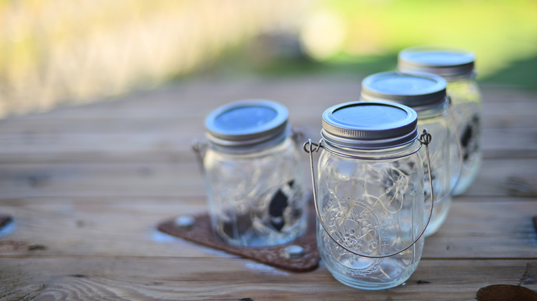 mason jars lined up on table