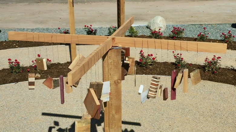 pieces of scrap wood made into DIY wind chime