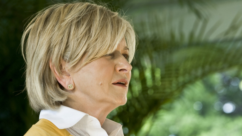 Martha Stewart speaking in a covered outdoor setting