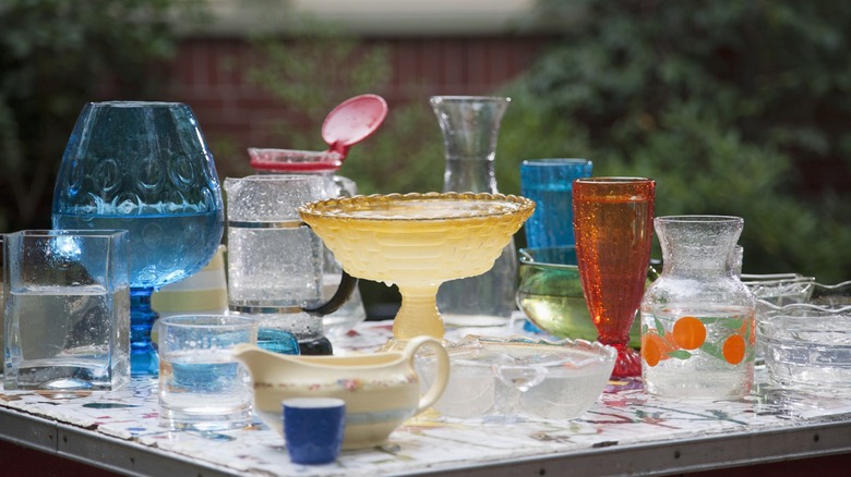 Colorful glassware on table outside
