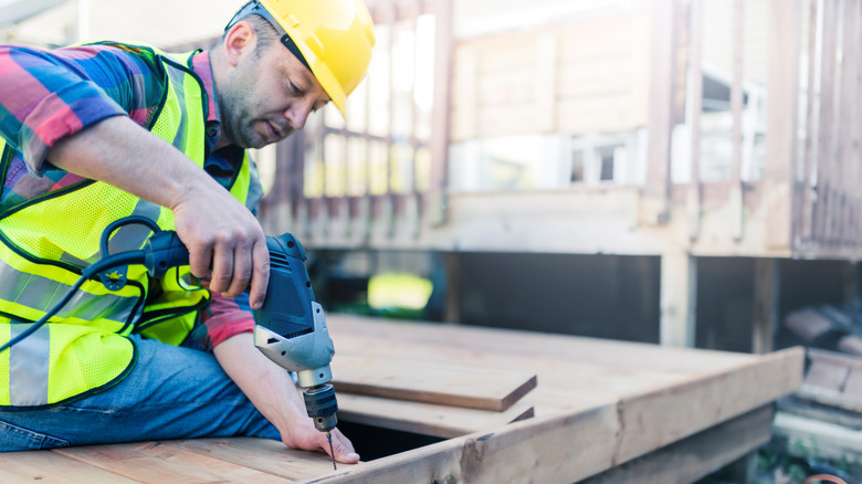 contractor works on deck