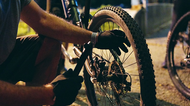 Person about to inflate bike tire