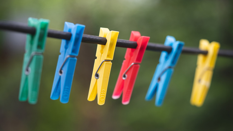Colorful clothespins on a line