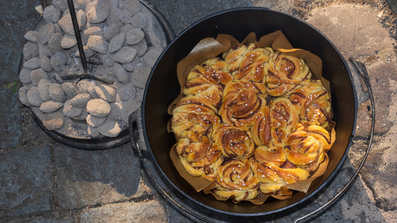 Campfire cinnamon rolls in a dutch oven