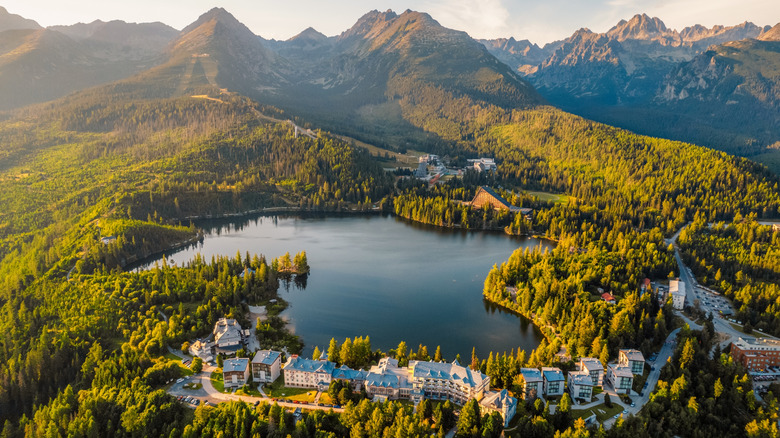 A mountain lake in Tatra National Park with buildings along one side