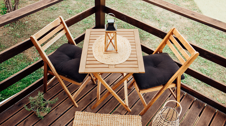 Wooden table with candle lantern