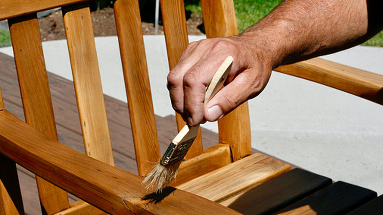 Applying a protective coating to a chair