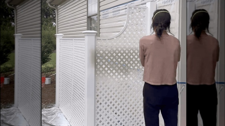 A TikTok DIYer builds a corral to hide her outdoor bins