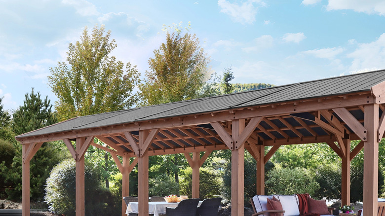 Generous space allows for full lounge and diner sets beneath Yardistry's multi-purpose shade structure
