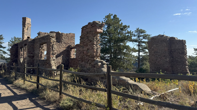 A view of John Brisben Walker's stone mansion ruins include exterior walls, chimney, and window openings.