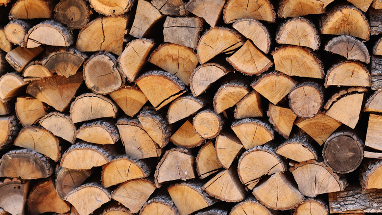 Turn A Pile Of Firewood Into A Stylish Outdoor Feature With This Stacking Method