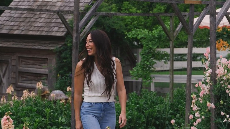 Joanna Gaines walking in her garden
