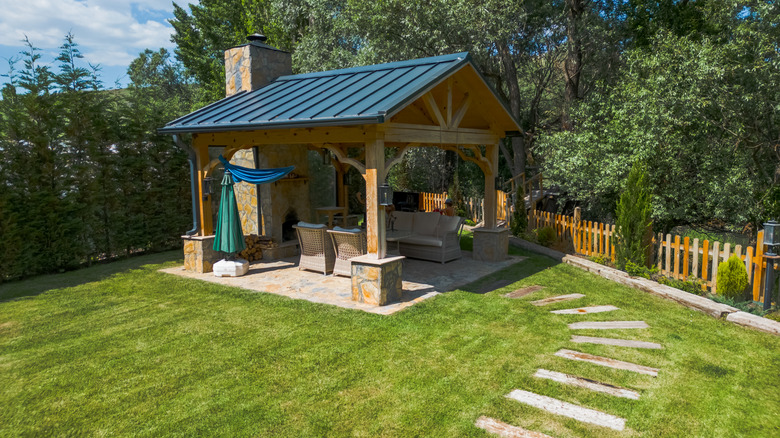 Backyard gazebo with fireplace