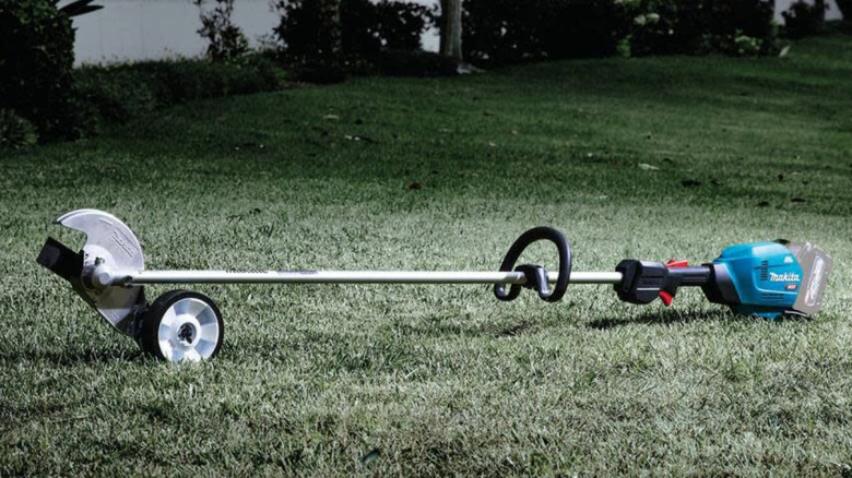 A close-up of the Makita edger, lying on the ground