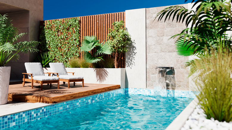 Peaceful pool area with greenery