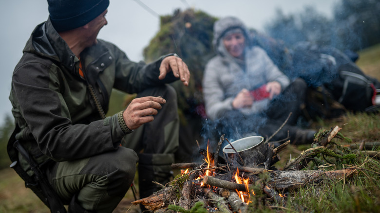 couple with a campfire