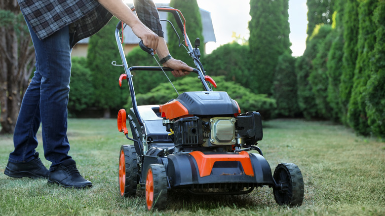 Pull starting a lawn mower