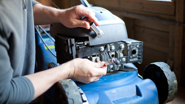 changing spark plug on lawn mower