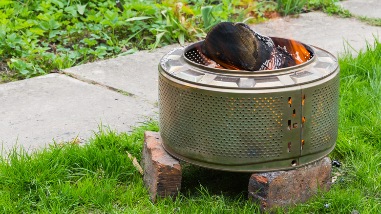 A DIY firepit from a repurposed washing machine drum