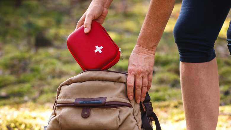 First aid kit placed in backpack 