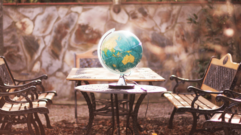 Globe on a table outside in patio