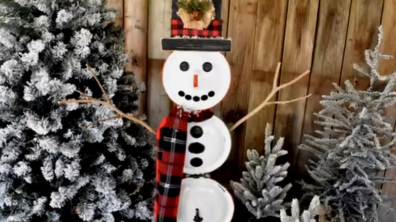 Garden snowman made of pot lids