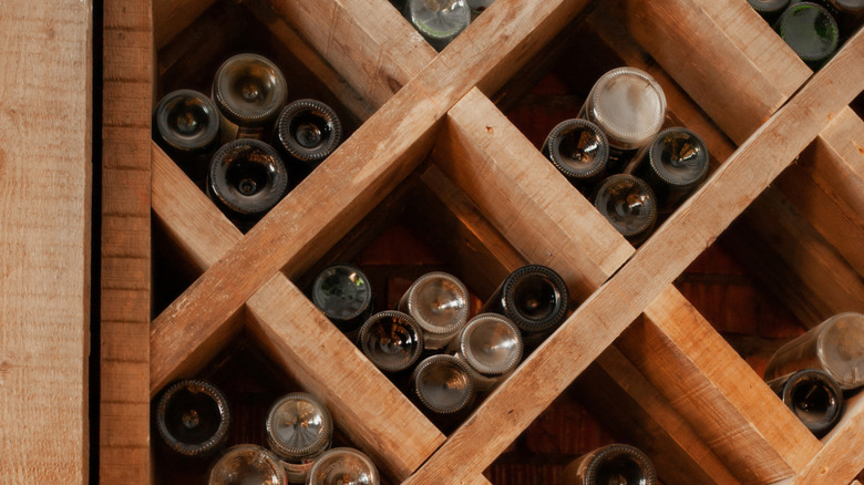 Wine rack with empty bottles