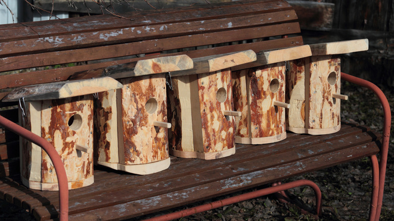 Birdhouses made of thick wooden planks